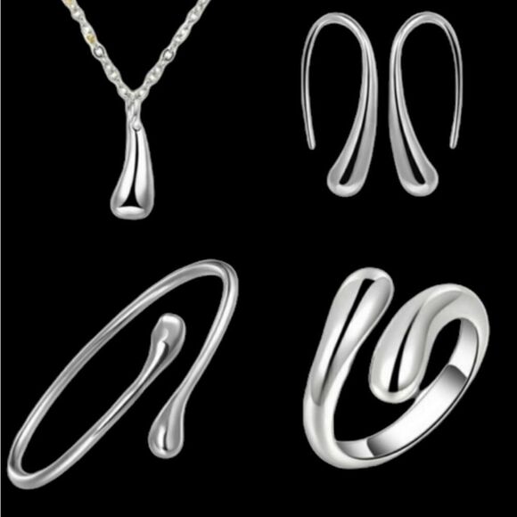 Silver teardrop set marked .925 - Picture 1 of 11